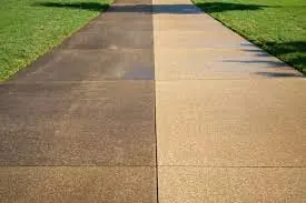Driveway half cleaned, showing the difference